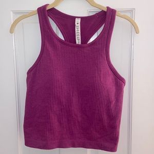 Lululemon cropped ebb to street tank purple/magenta color.